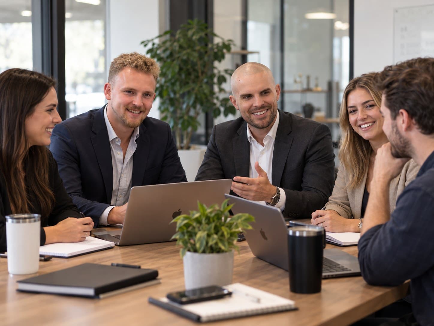The DealerForge team working together around the table