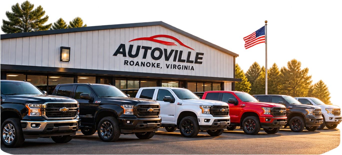 A dealership storefront with a row of trucks out front